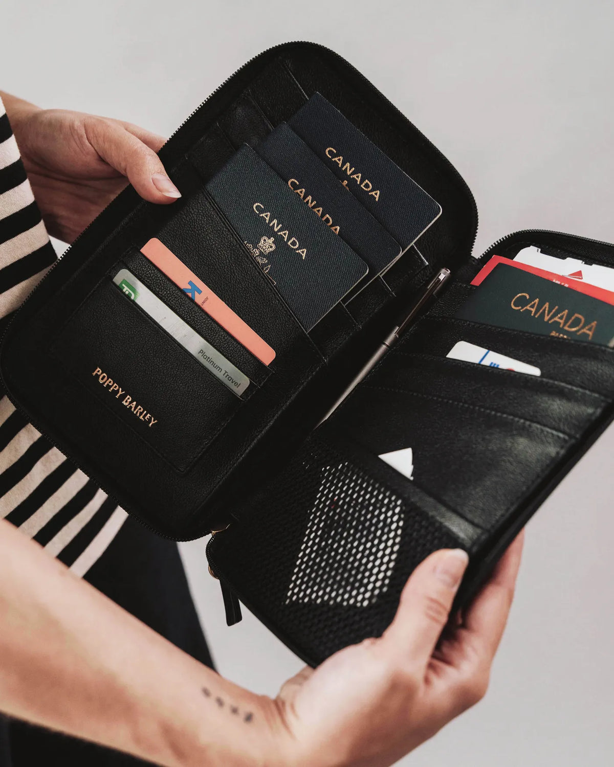 The Six Person Family Passport Holder Black Micro Pebble